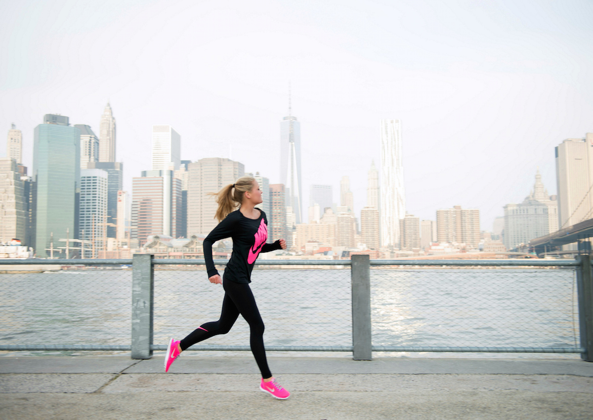 Beautiful Woman Stretching Before City Run Sportswear Skyline