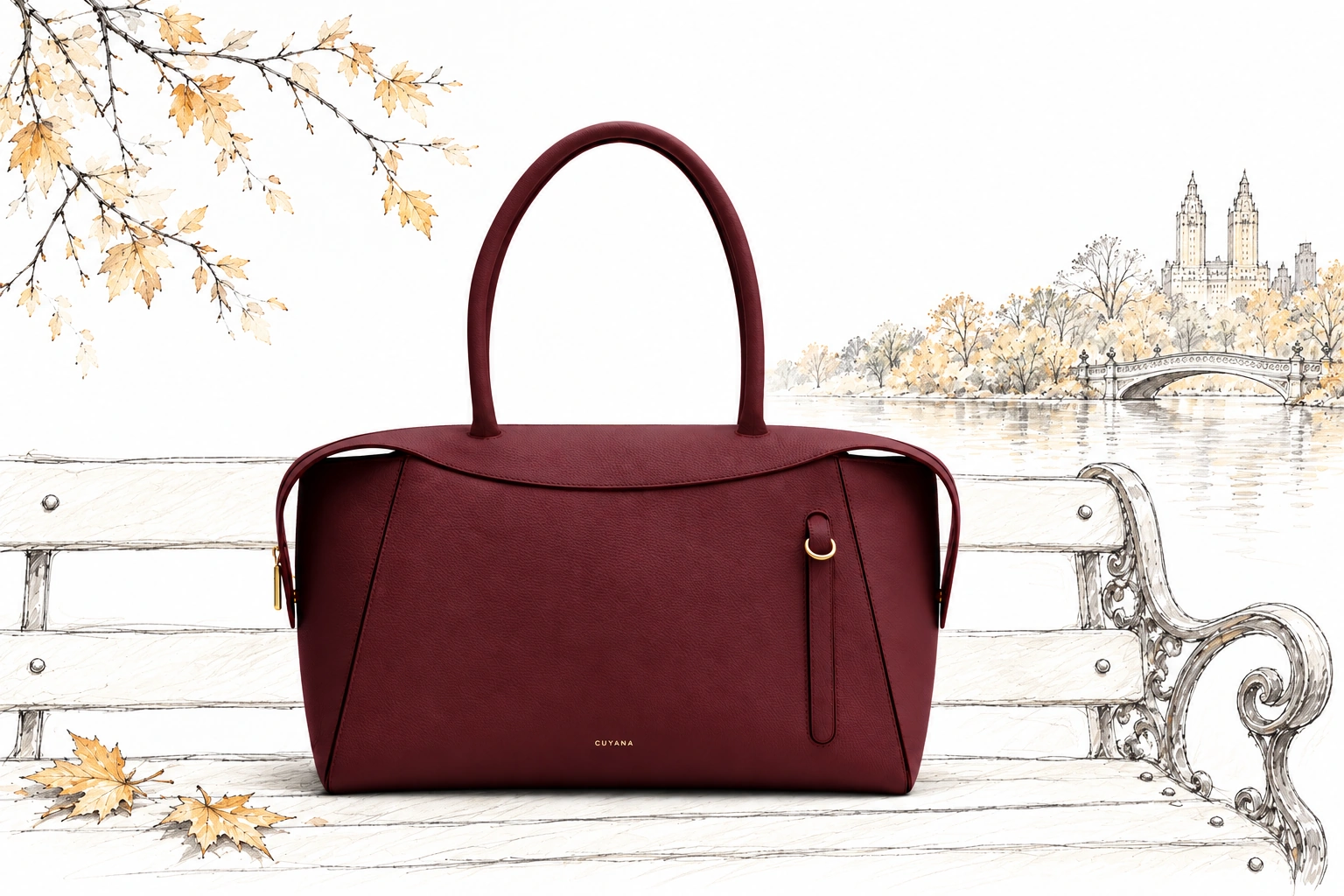 Cherry Cuyana Forma Bowler Bag on a delicately sketched Central Park bench with pale autumn leaves and Bow Bridge in the distance